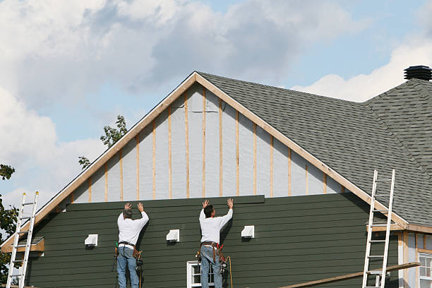 Professional Siding technician working in Quincy, OH